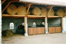 Geschwungene Klappbare Frontw�nde mit kontinuierlicher Raufutterzugabe von der Seite - Erlinghausen